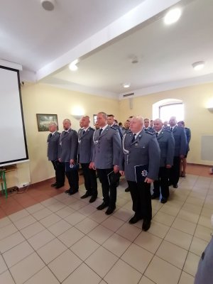 Na zdjęciu znajdują się policjanci podczas uroczystej zbiórki w związku ze Świętem Policji 2019 r.